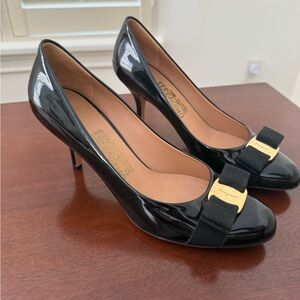Salvatore Ferragamo Black Heels with Gold Bow Detail